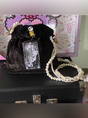 Pearl-Strand Black Velvet Drawstring Crossbody Bag